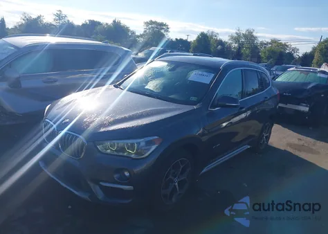 2017 BMW X1 xDrive28I z USA, uszkodzony, nr VIN WBXHT3Z31H4A57231